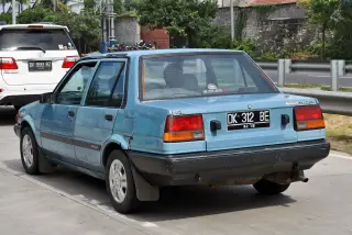 Archive photo: Toyota Corolla GL (AE80) in around Bypass Ida Bagus Mantra, Gianyar Regency, Bali.
