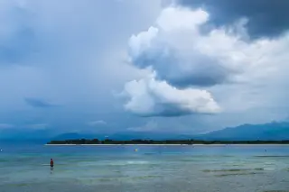 Archive photo: Calm equatorial tropical thunderstorm clouds over the Lombok Strait, Gili Islands, Sunda Islands, West Nusa Tenggara, Indonesia in the intertropi…